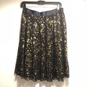 Calvin Klein pleated chiffon skirt w gold print